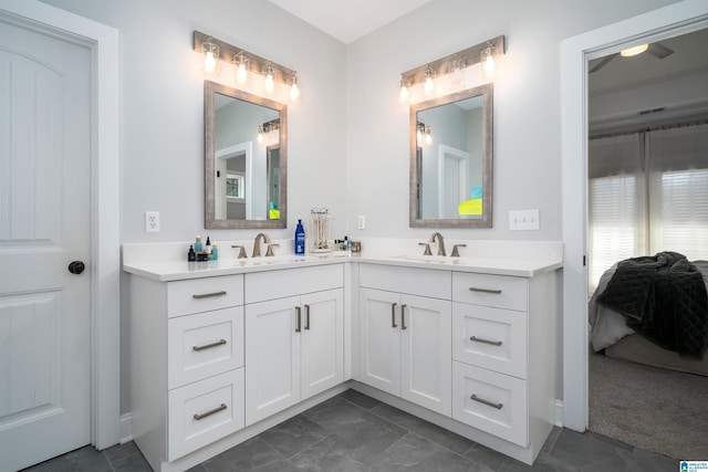 bathroom with vanity and tile patterned flooring