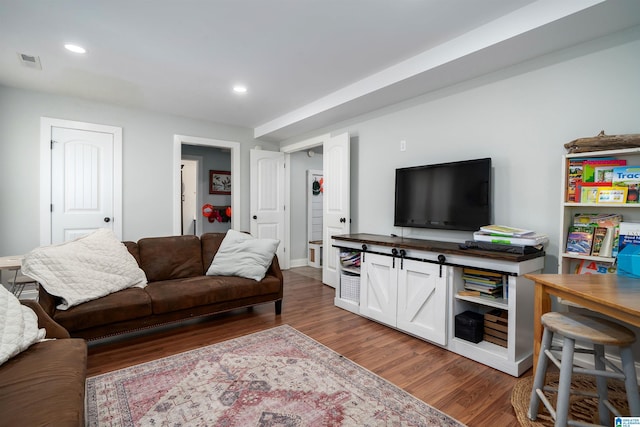 living room with dark wood-type flooring