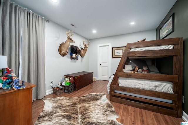 bedroom featuring light hardwood / wood-style floors