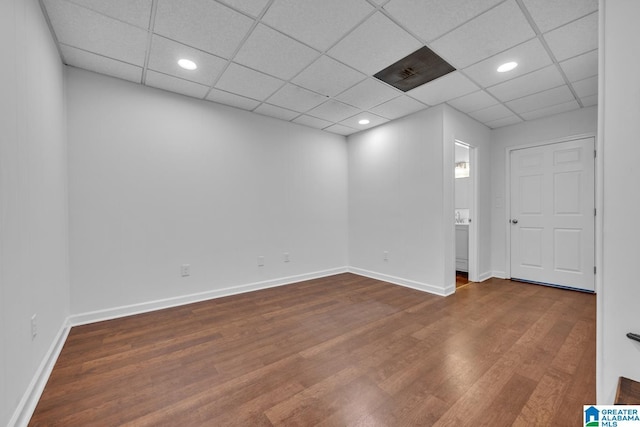 unfurnished room with hardwood / wood-style floors