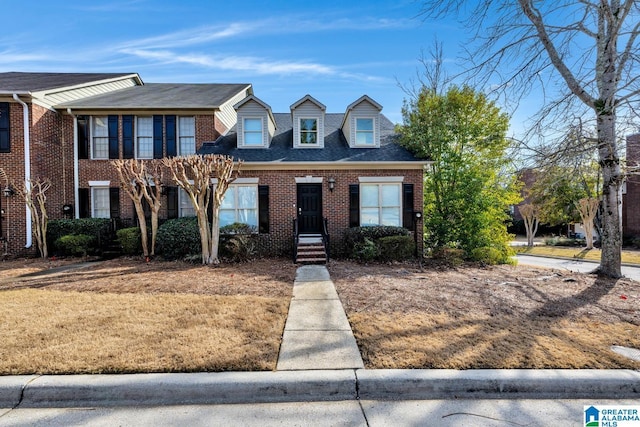 view of front of property with a front lawn