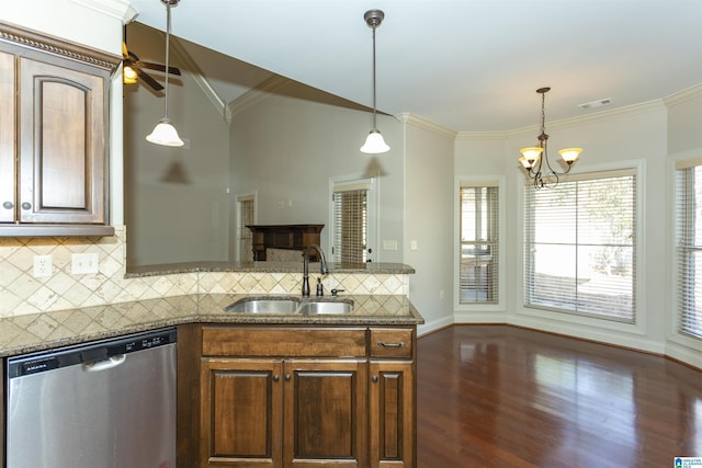 kitchen featuring sink, backsplash, dark hardwood / wood-style floors, ornamental molding, and stainless steel dishwasher