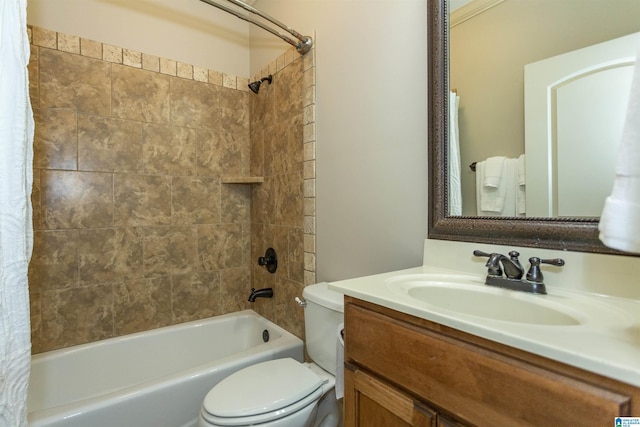 full bathroom with shower / bath combo, vanity, and toilet