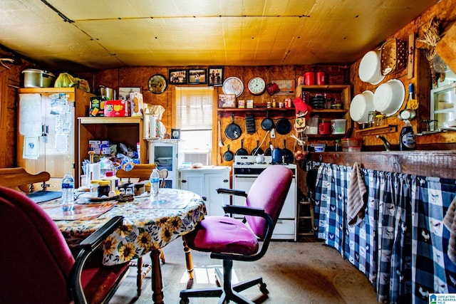 home office featuring wooden walls