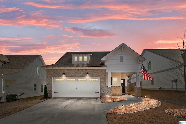 view of front of property featuring a garage