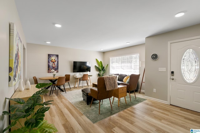 dining area with light wood-type flooring