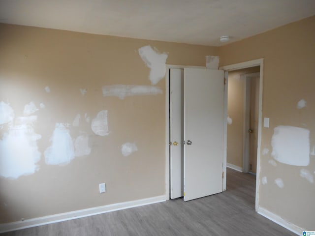 unfurnished bedroom featuring light hardwood / wood-style floors