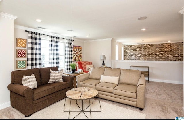 carpeted living room featuring ornamental molding and brick wall