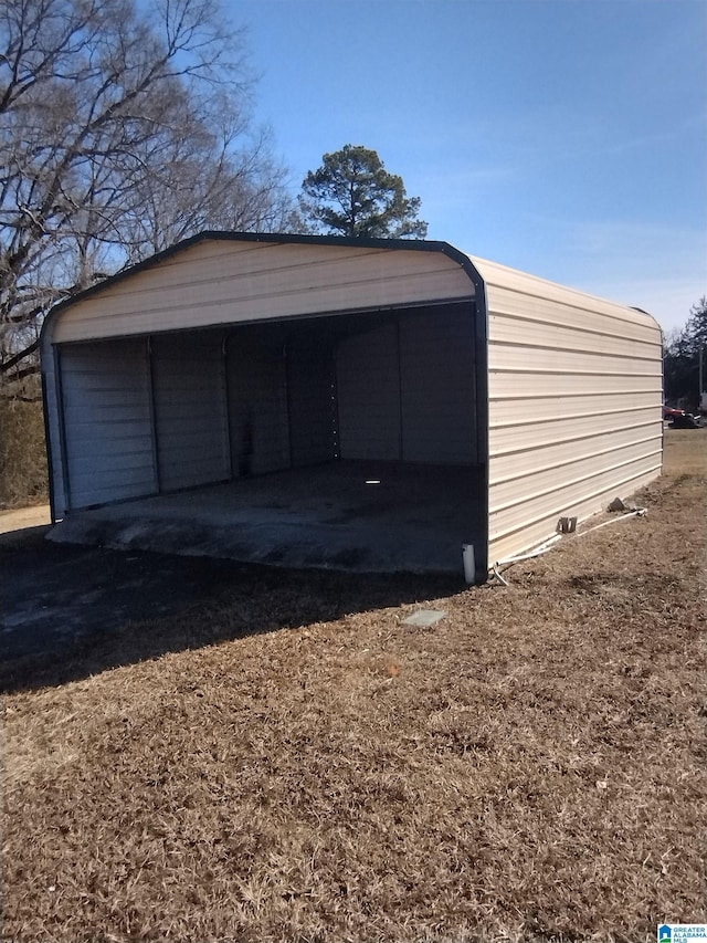 garage with a carport