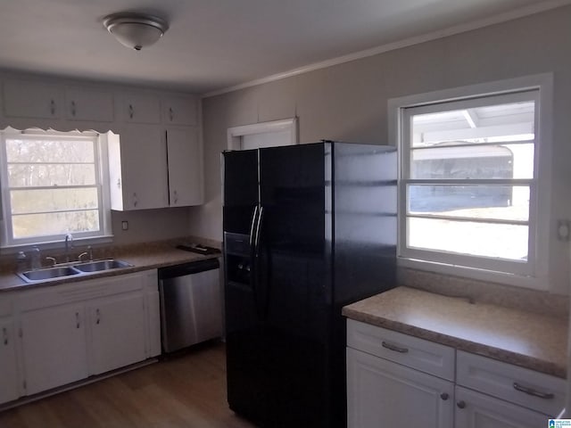 kitchen featuring black fridge with ice dispenser, sink, wood-type flooring, dishwasher, and white cabinets