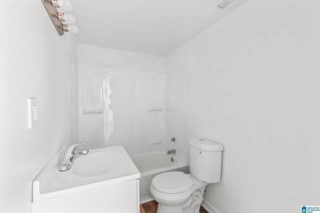 full bathroom with vanity, shower / bathing tub combination, and toilet