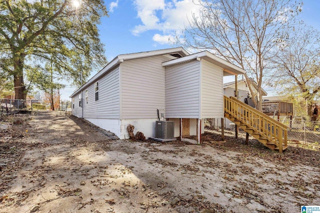 view of home's exterior featuring cooling unit