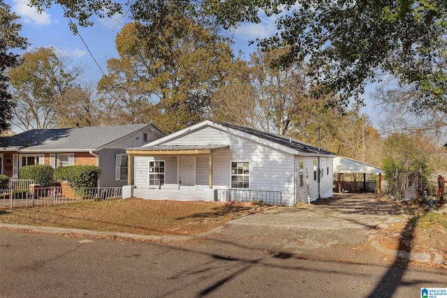 view of front facade with a carport