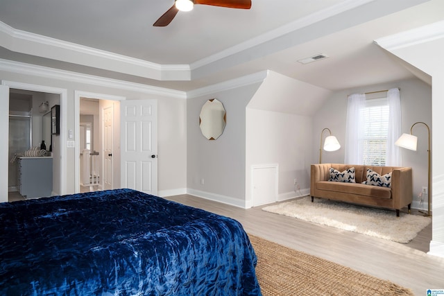 bedroom featuring crown molding, ceiling fan, and light hardwood / wood-style floors