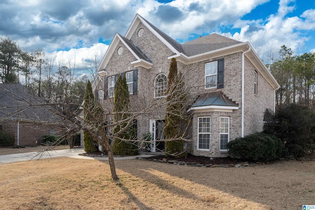 view of property featuring a front yard