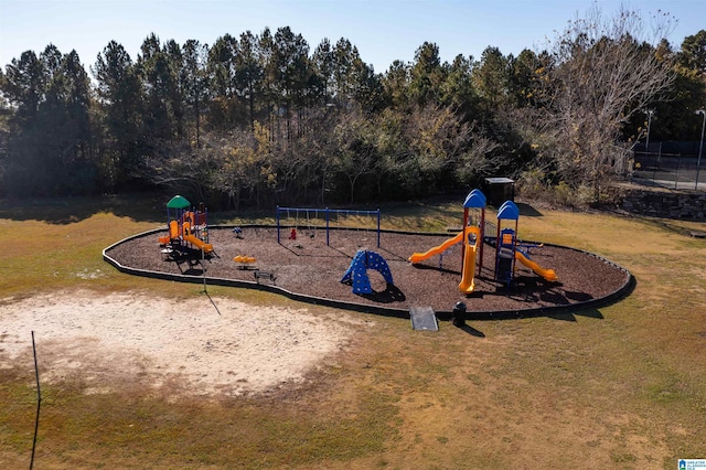 surrounding community with a yard and a playground