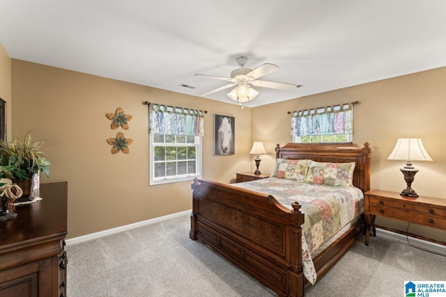 carpeted bedroom with ceiling fan