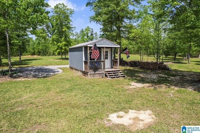 view of outdoor structure featuring a yard