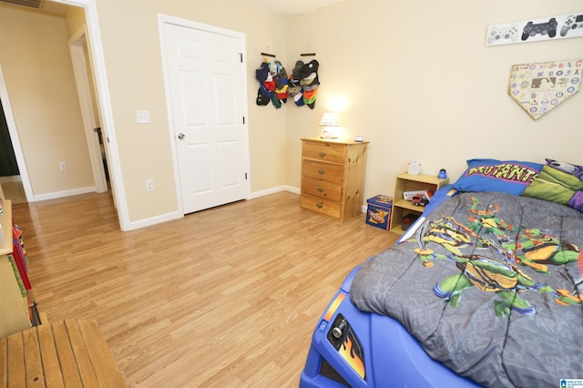 bedroom featuring hardwood / wood-style flooring