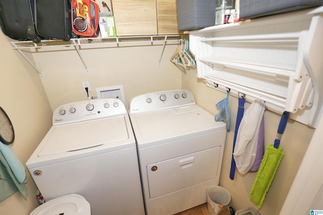 laundry room featuring washer and clothes dryer