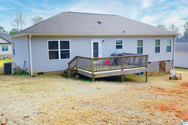 back of property featuring a wooden deck and central AC unit