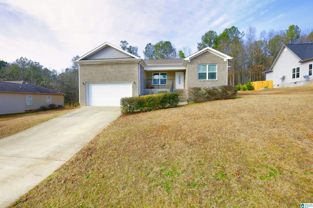 view of front of property with a garage and a front yard