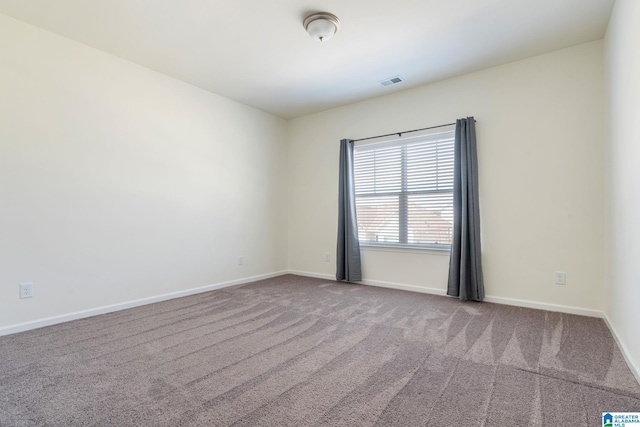 empty room with carpet floors