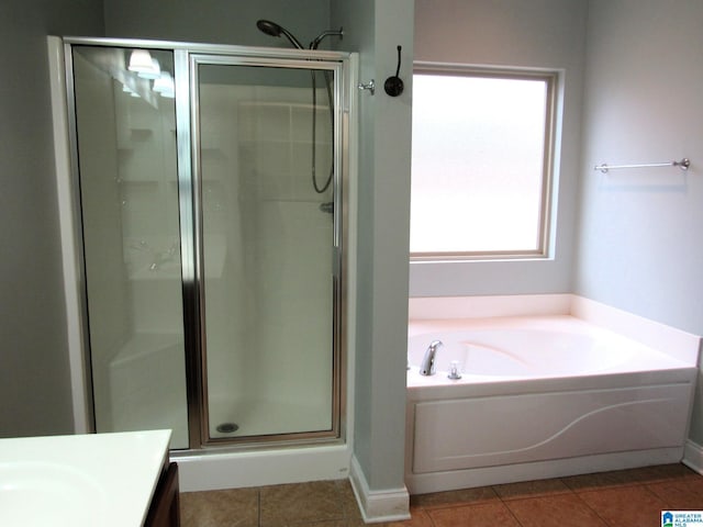 bathroom featuring vanity, tile patterned floors, and independent shower and bath