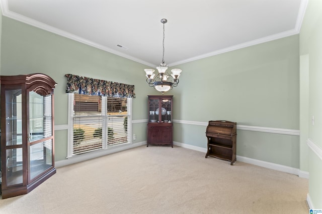 unfurnished dining area featuring a chandelier, carpet flooring, visible vents, baseboards, and ornamental molding