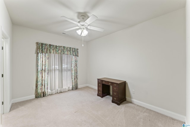 interior space with a ceiling fan, visible vents, and baseboards