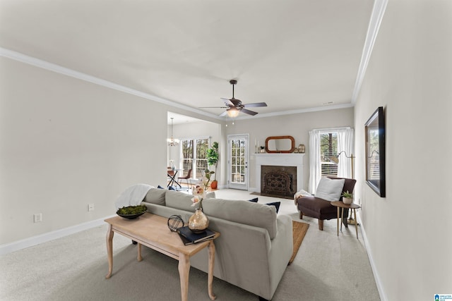 living area with crown molding, a fireplace with flush hearth, light colored carpet, and baseboards