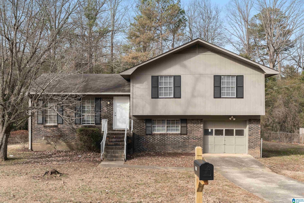 split level home with a garage