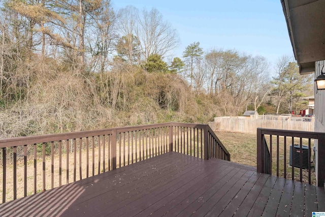 wooden deck with central air condition unit