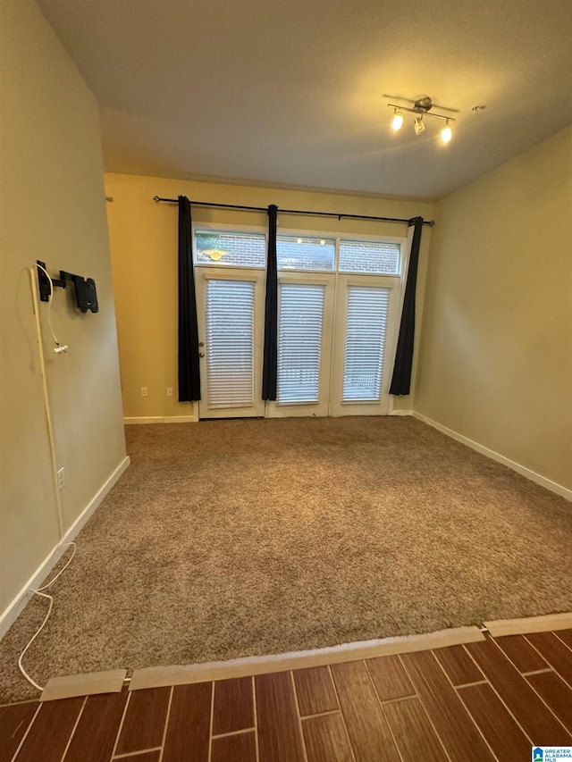 empty room featuring wood-type flooring