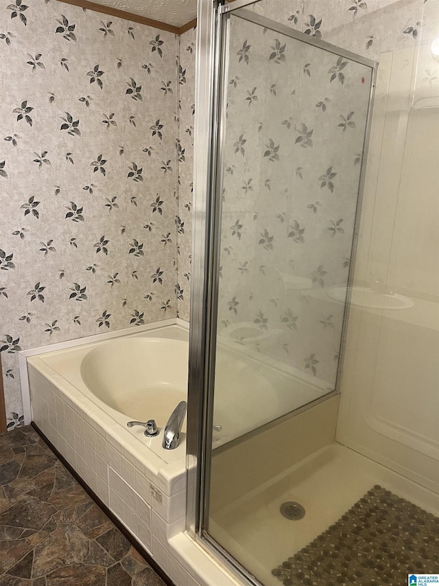 bathroom featuring independent shower and bath and crown molding