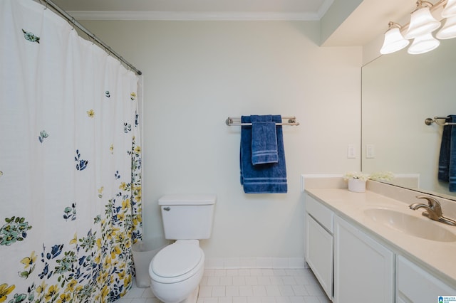 bathroom featuring tile patterned flooring, ornamental molding, vanity, and toilet