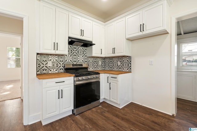 kitchen with plenty of natural light, white cabinets, wood counters, and stainless steel gas stove