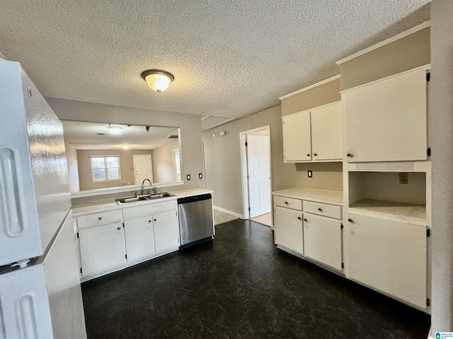 kitchen featuring sink, stainless steel dishwasher, white cabinets, and a textured ceiling