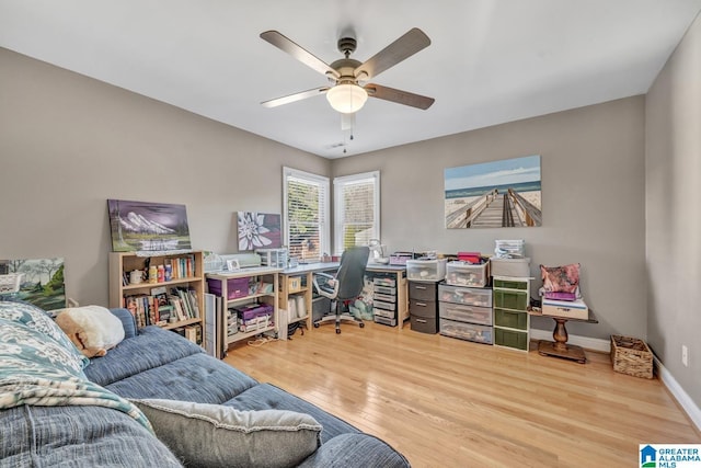 office area featuring wood-type flooring and ceiling fan