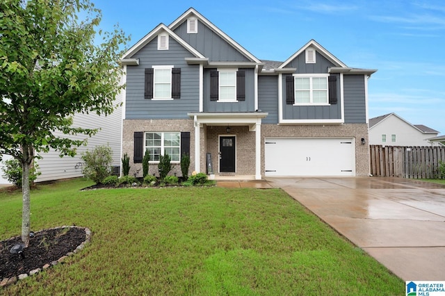 view of front facade featuring a garage and a front yard