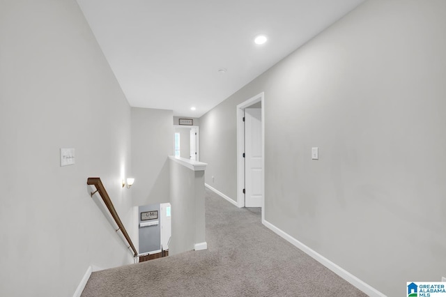 corridor featuring carpet flooring