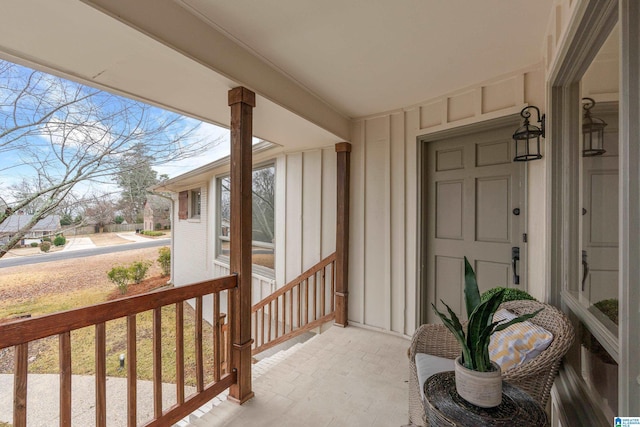 entrance to property featuring a porch