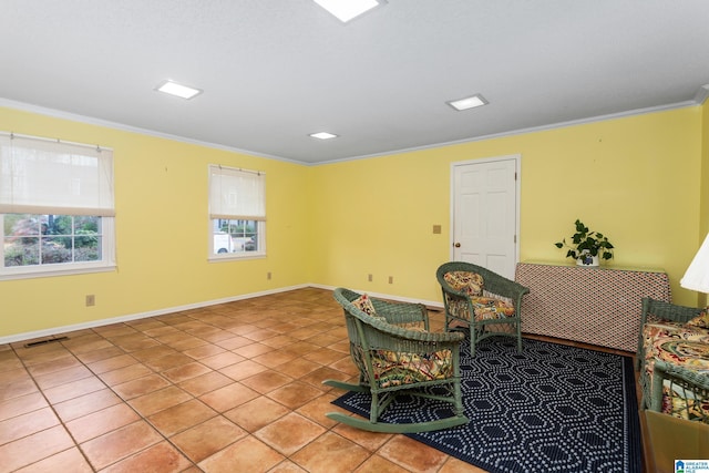 living area with ornamental molding and light tile patterned flooring