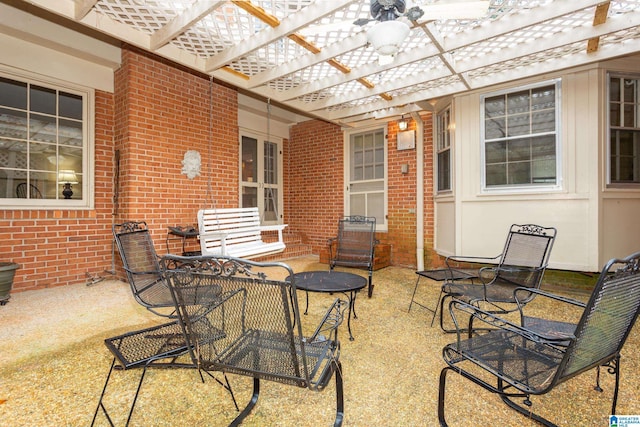 view of patio featuring a pergola