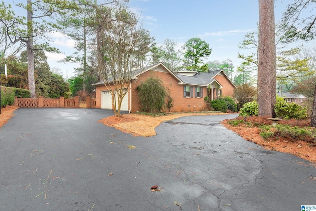 ranch-style house with a garage