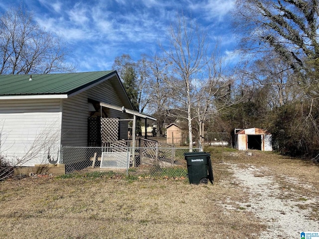 view of property exterior featuring a storage unit