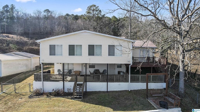 exterior space featuring a wooden deck and a yard