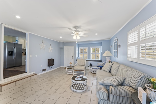 tiled living room featuring crown molding and ceiling fan