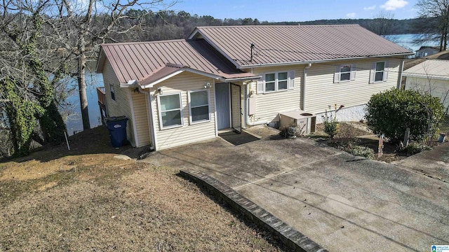 view of front of house with central air condition unit