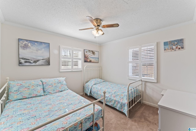 carpeted bedroom with ceiling fan, ornamental molding, and a textured ceiling